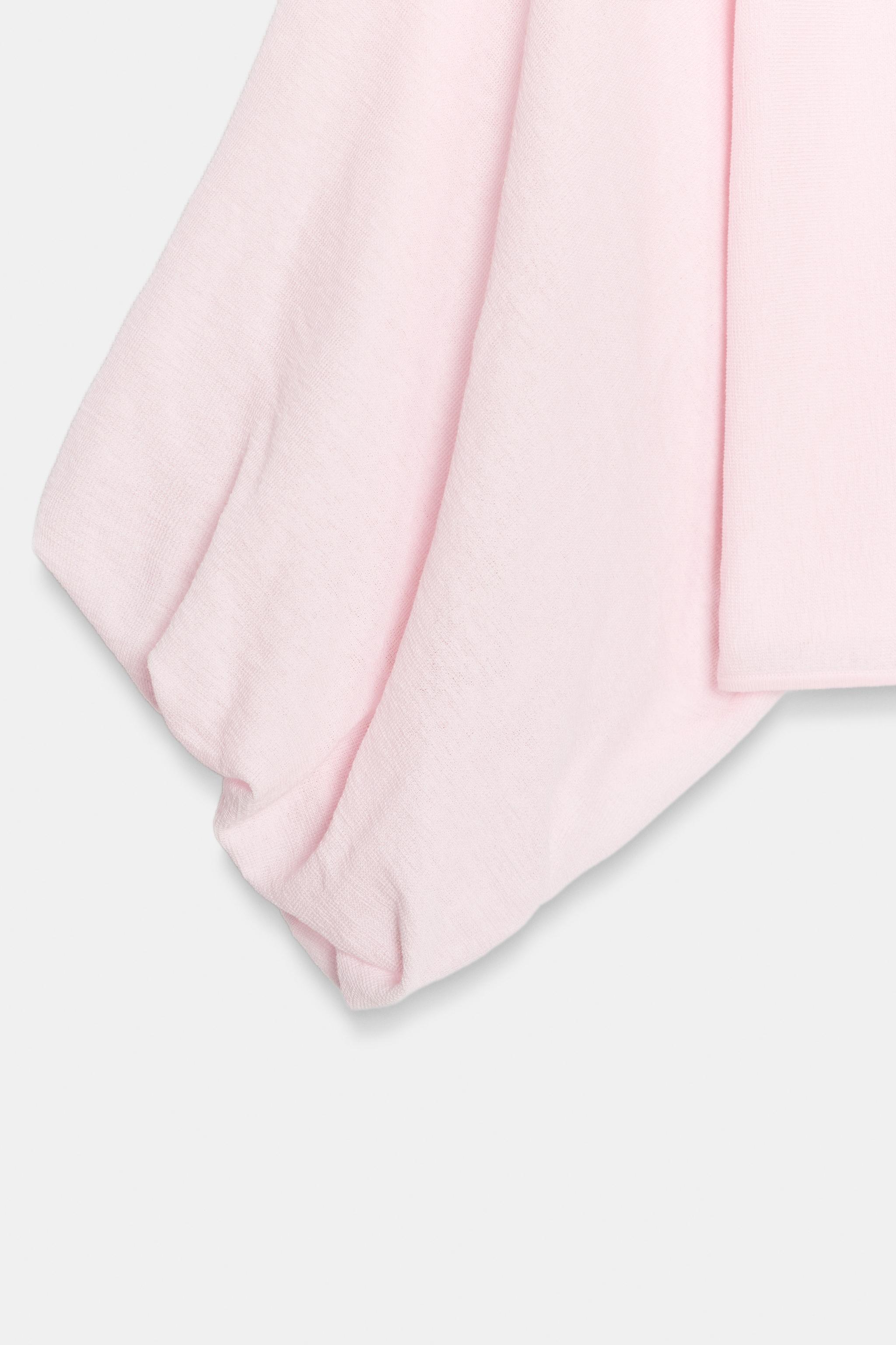TOP EN MAILLE ET MANCHES AMPLES